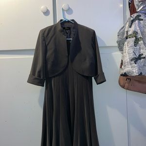 A size 8, light gray dress + matching jacket. Made by R & M Richard's.